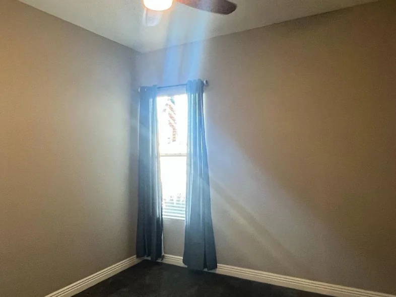 Before: empty bedroom with bare walls